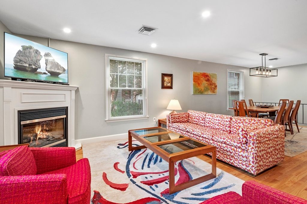 Dining room, Fireplace, Interior, Living room, Pendant Lights, Recessed Lighting, Wood Texture Flooring