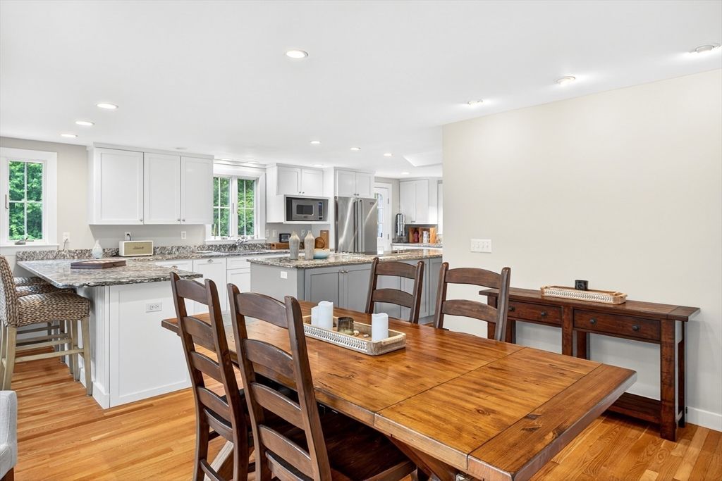 Dining room, Interior, Kitchen, Recessed Lighting, Stainless Steel Appliances, Wood Texture Flooring