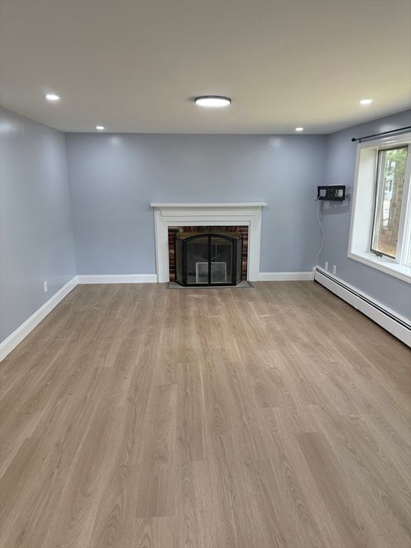 Empty room, Fireplace, Interior, Recessed Lighting, Wood Texture Flooring