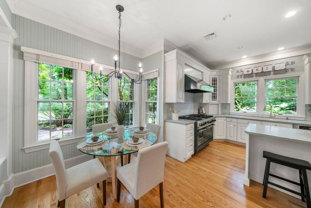 Dining room, Interior, Kitchen, Pendant Lights, Recessed Lighting, Stainless Steel Appliances, Wood Texture Flooring