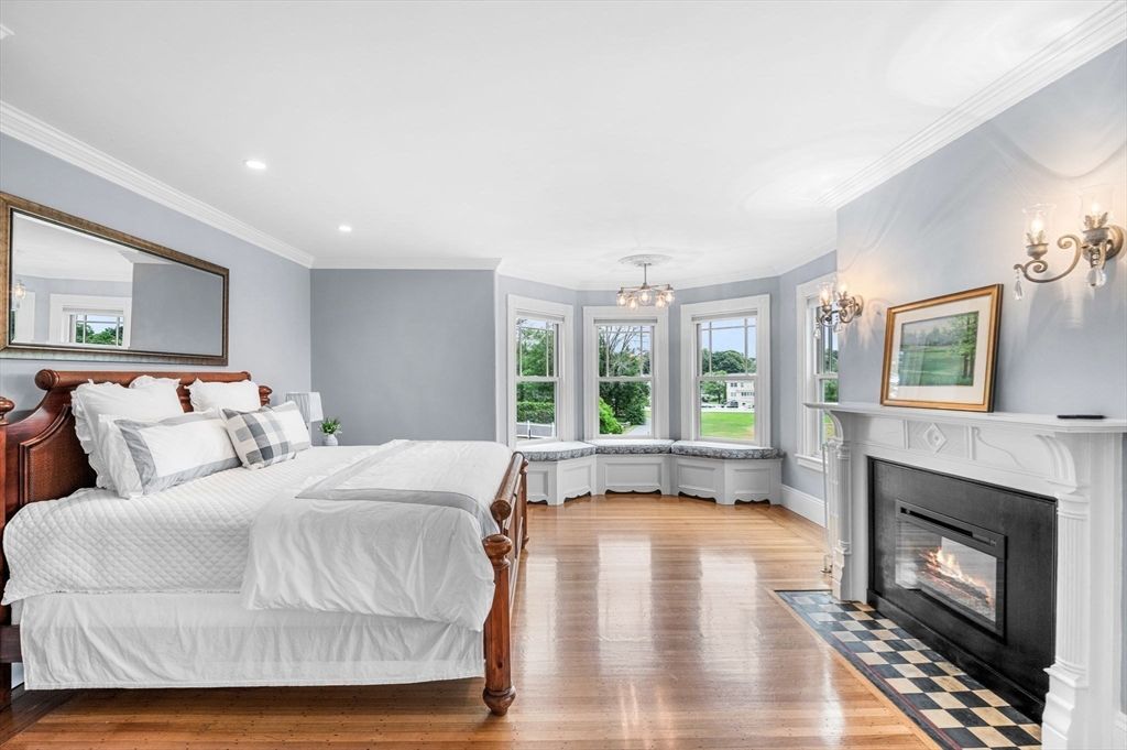 Bedroom, Chandelier, Fireplace, Interior, Recessed Lighting, Wood Texture Flooring