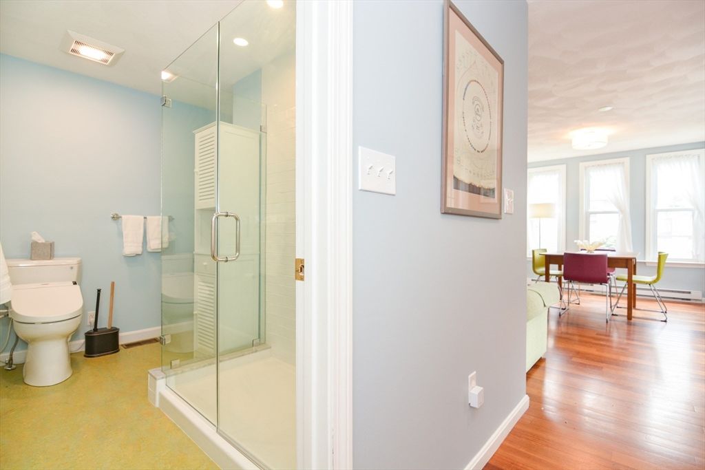 Bathroom, Dining room, Glass Shower, Interior, Recessed Lighting, Wood Texture Flooring