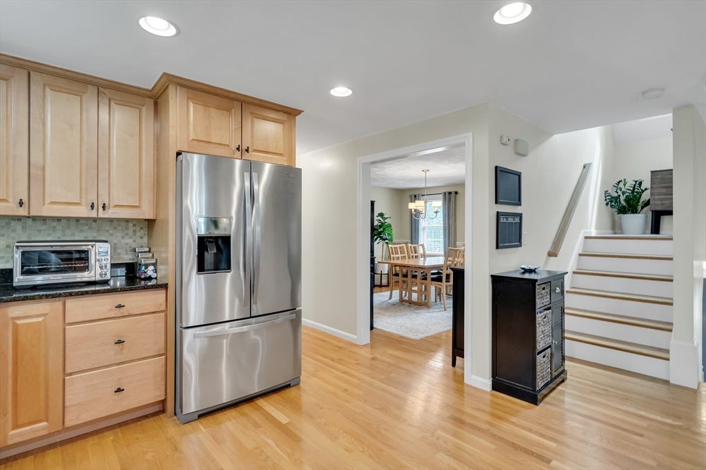 Chandelier, Dining room, Interior, Kitchen, Pendant Lights, Recessed Lighting, Stainless Steel Appliances, Wood Texture Flooring