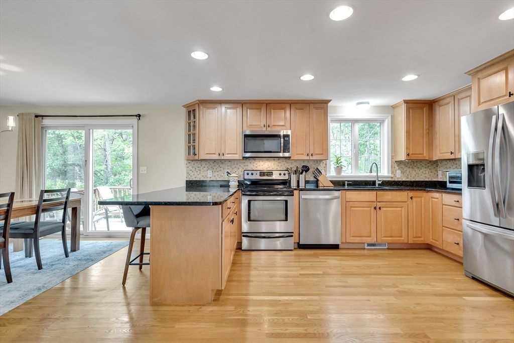 Dining room, Interior, Kitchen, Recessed Lighting, Stainless Steel Appliances, Wood Texture Flooring
