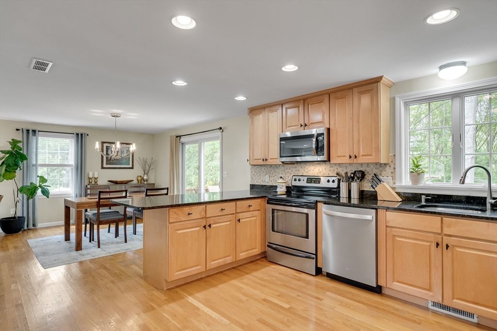 Dining room, Interior, Kitchen, Pendant Lights, Recessed Lighting, Stainless Steel Appliances, Wood Texture Flooring