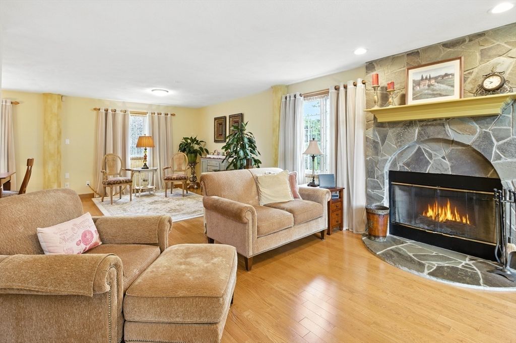 Dining room, Fireplace, Interior, Living room, Recessed Lighting, Wood Texture Flooring