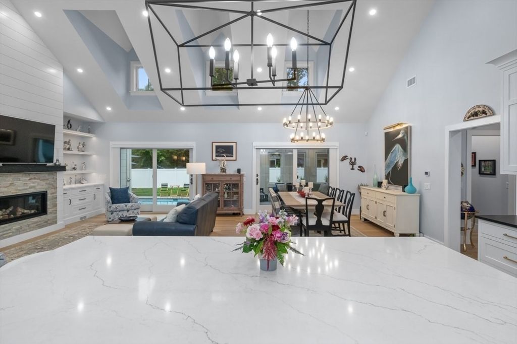 Chandelier, Dining room, Fireplace, Interior, Kitchen, Living room, Pendant Lights, Recessed Lighting, Wood Texture Flooring