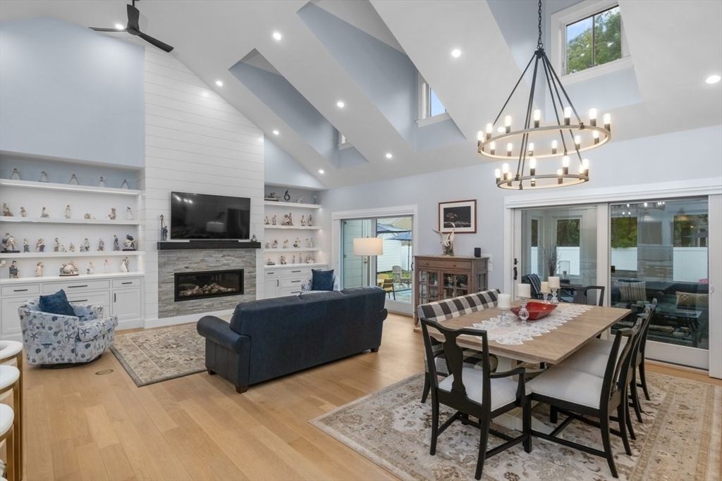Dining room, Fireplace, Interior, Living room, Pendant Lights, Recessed Lighting, Wood Texture Flooring