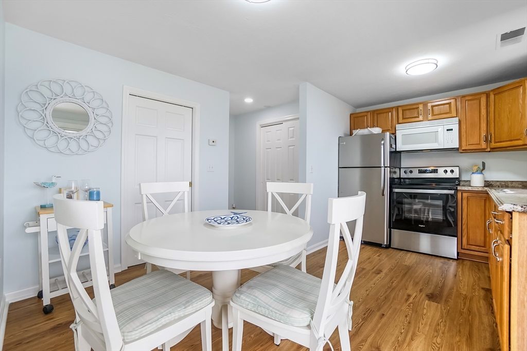 Dining room, Interior, Kitchen, Recessed Lighting, Stainless Steel Appliances, Wood Texture Flooring