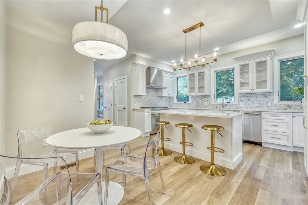 Dining room, Interior, Kitchen, Pendant Lights, Recessed Lighting, Stainless Steel Appliances, Wood Texture Flooring