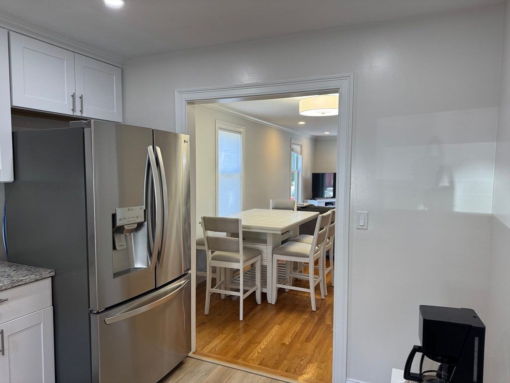 Dining room, Interior, Kitchen, Recessed Lighting, Stainless Steel Appliances, Wood Texture Flooring