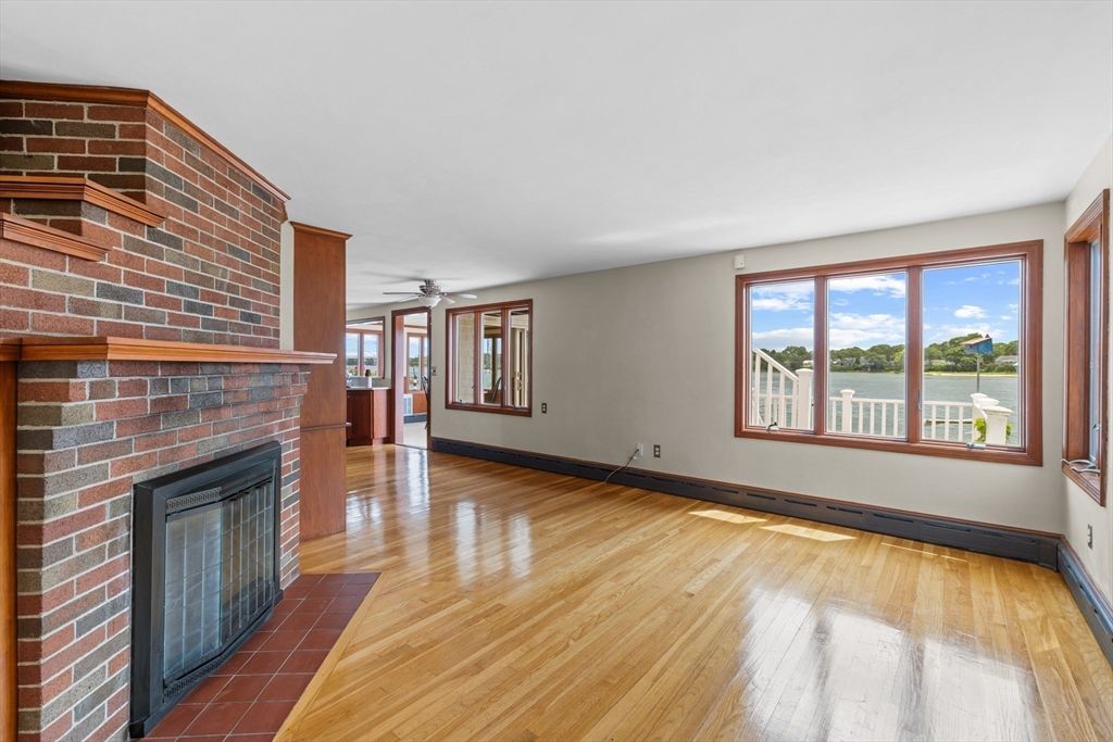 Empty room, Fireplace, Interior, Stone Walls, Water, Wood Texture Flooring