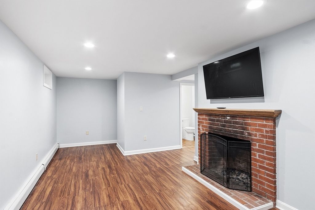 Empty room, Fireplace, Interior, Recessed Lighting, Wood Texture Flooring