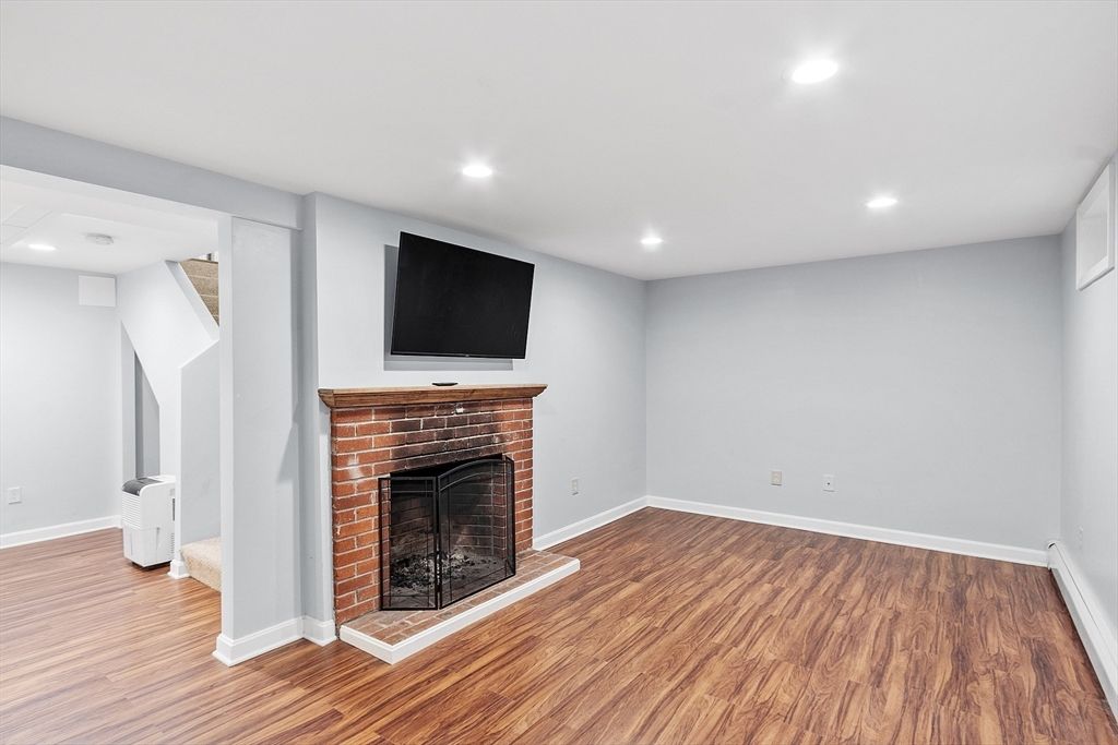 Empty room, Fireplace, Interior, Recessed Lighting, Wood Texture Flooring