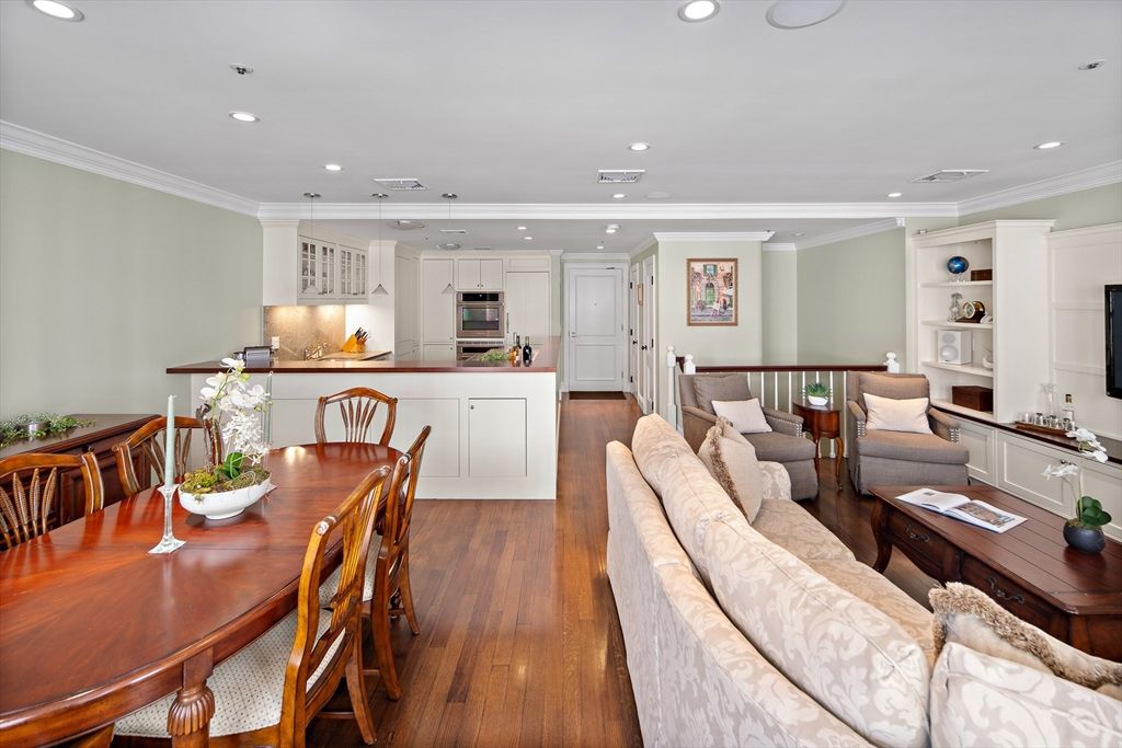 Dining room, Interior, Kitchen, Living room, Pendant Lights, Recessed Lighting, Stainless Steel Appliances, Wood Texture Flooring