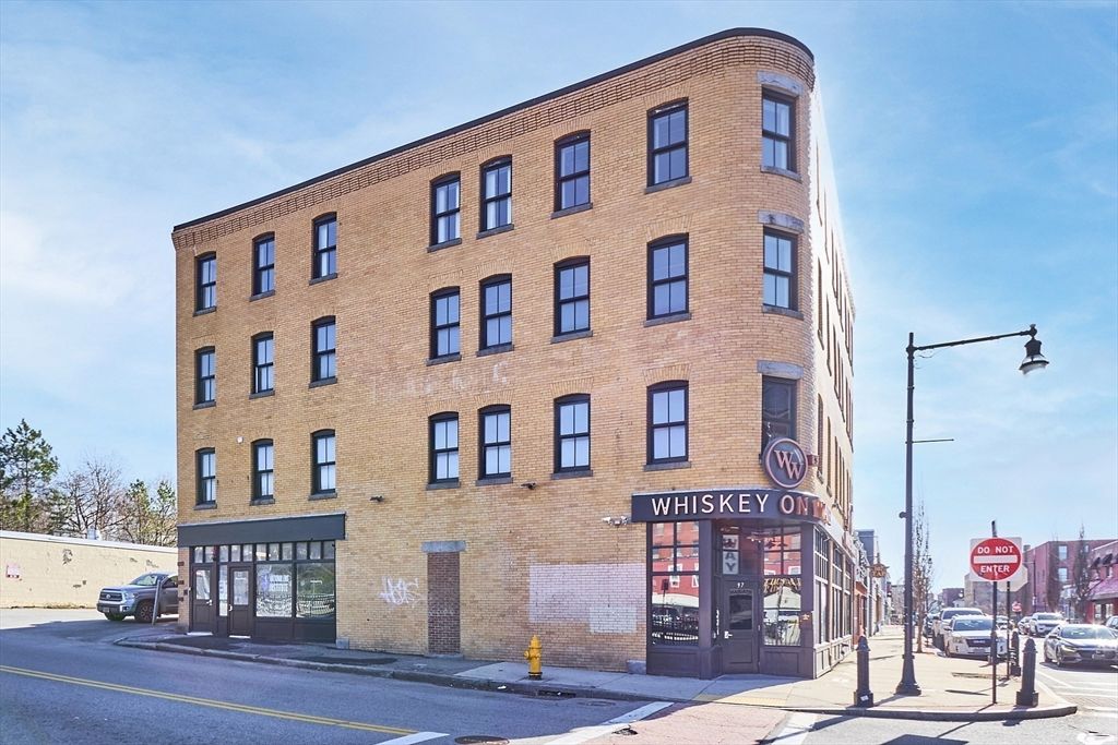 Exterior, Facade, Brick Facade, Condo Building