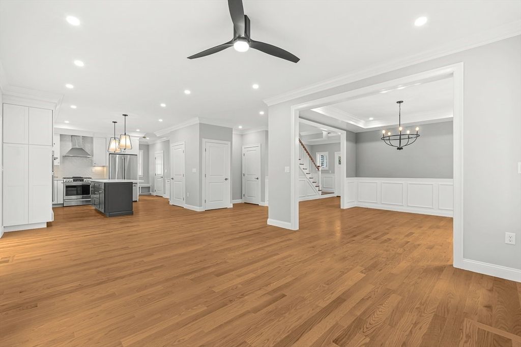 Chandelier, Empty room, Interior, Kitchen, Pendant Lights, Recessed Lighting, Stainless Steel Appliances, Wood Texture Flooring
