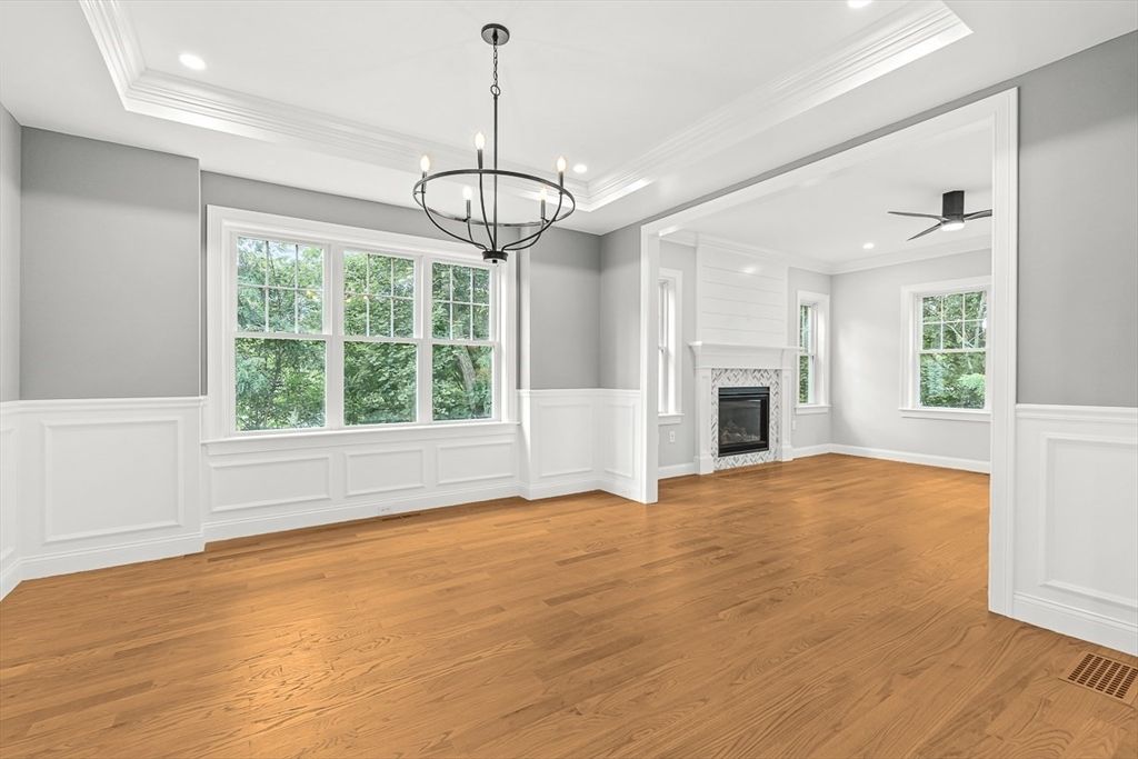Chandelier, Empty room, Fireplace, Interior, Pendant Lights, Recessed Lighting, Wood Texture Flooring