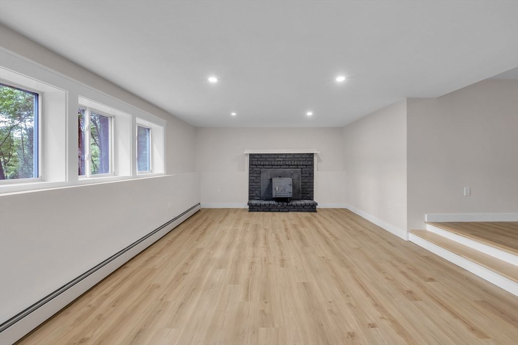 Empty room, Fireplace, Interior, Recessed Lighting, Wood Texture Flooring