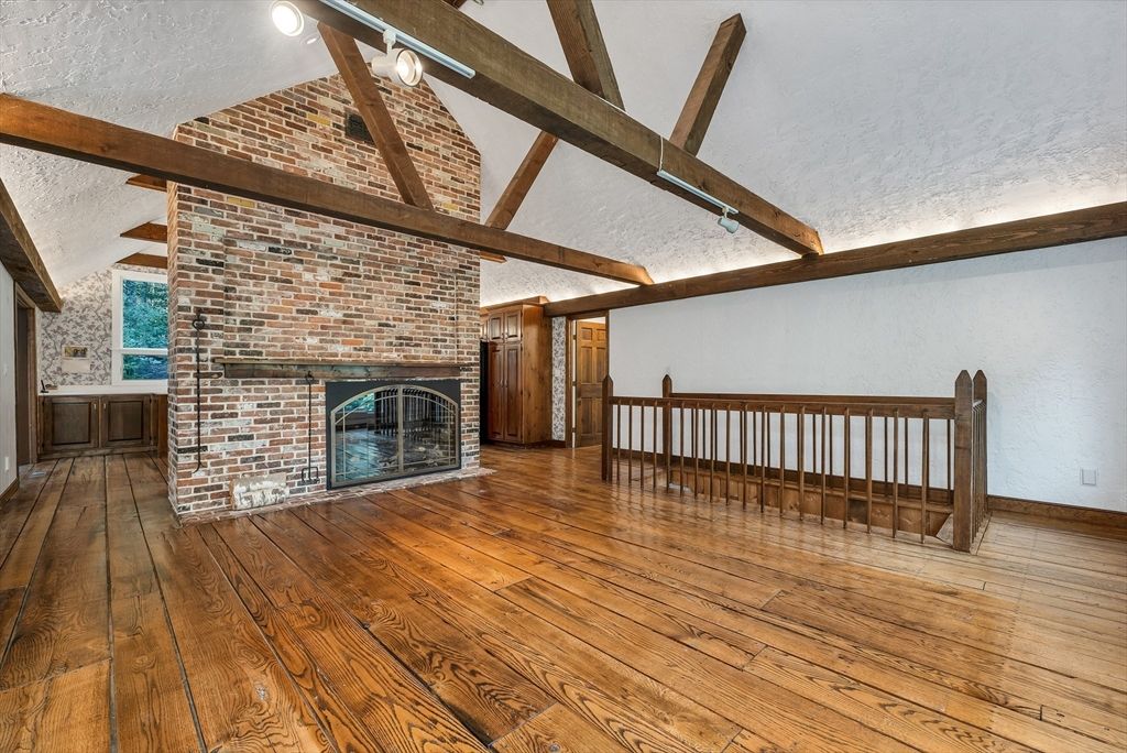 Empty room, Fireplace, Interior, Stone Walls, Wooden Beams, Wood Texture Flooring