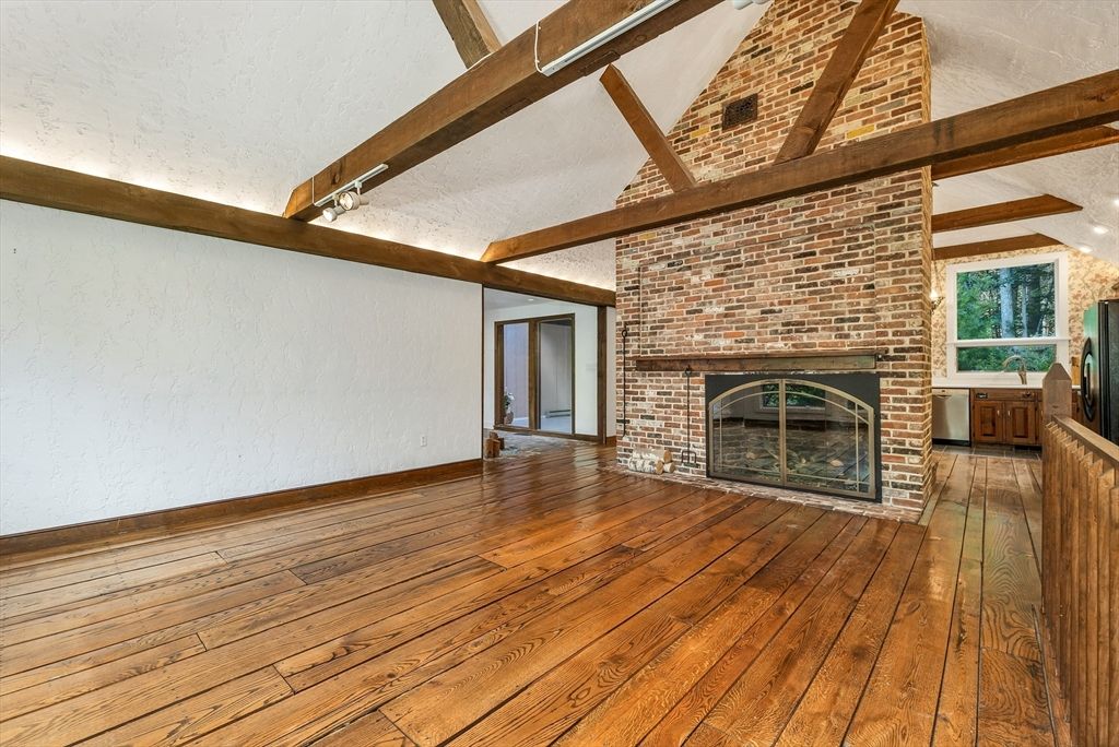 Empty room, Fireplace, Interior, Stone Walls, Wooden Beams, Wood Texture Flooring