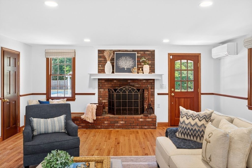 Fireplace, Interior, Living room, Recessed Lighting, Stone Walls, Wood Texture Flooring