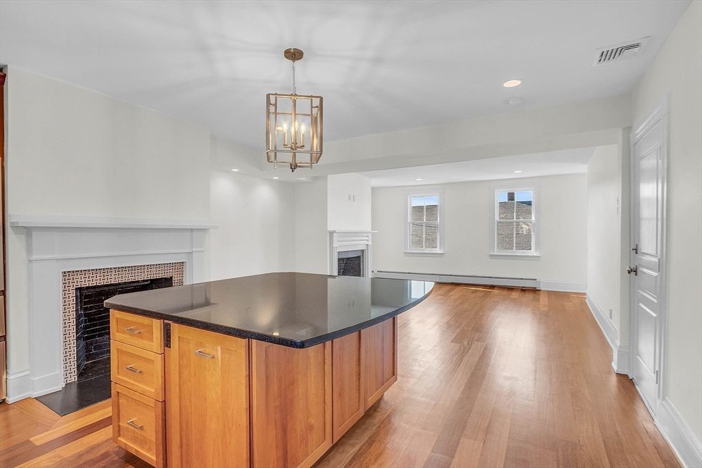 Fireplace, Interior, Pendant Lights, Recessed Lighting, Wood Texture Flooring