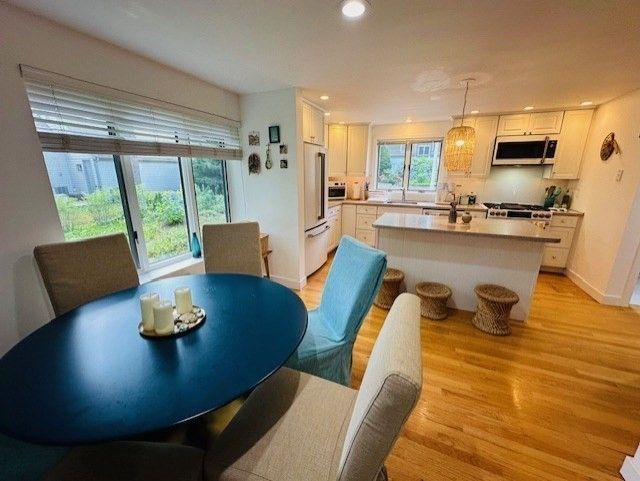 Dining room, Interior, Kitchen, Pendant Lights, Recessed Lighting, Stainless Steel Appliances, Wood Texture Flooring
