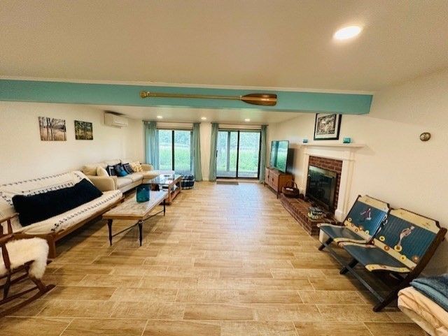 Fireplace, Interior, Living room, Recessed Lighting, Wood Texture Flooring
