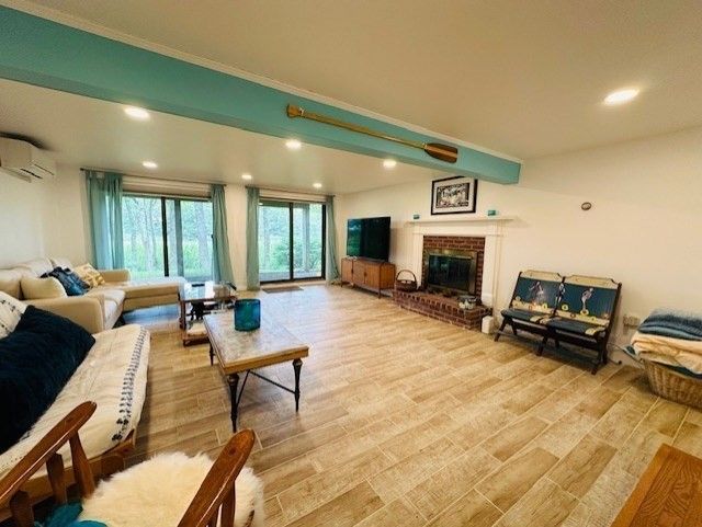 Fireplace, Interior, Living room, Recessed Lighting, Wood Texture Flooring