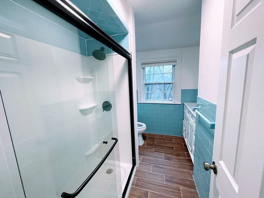 Bathroom, Glass Shower, Interior, Tile Countertops, Wood Texture Flooring