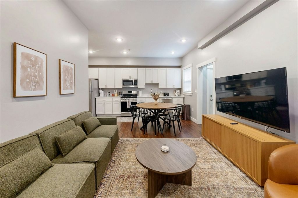 Dining room, Interior, Kitchen, Living room, Recessed Lighting, Stainless Steel Appliances, Wood Texture Flooring