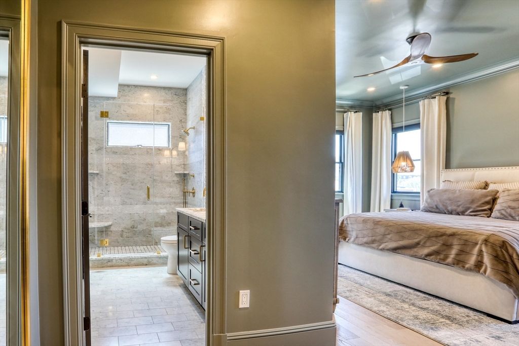 Bathroom, Bedroom, Glass Shower, Interior, Pendant Lights, Recessed Lighting, Stone Walls, Wood Texture Flooring