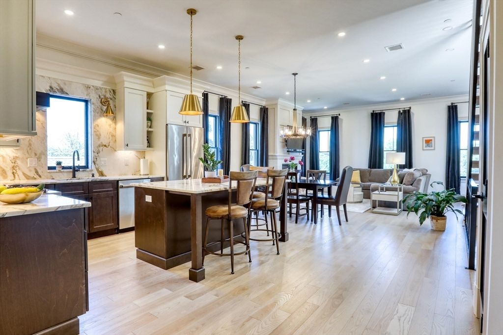 Dining room, Interior, Kitchen, Living room, Pendant Lights, Recessed Lighting, Stainless Steel Appliances, Wood Texture Flooring
