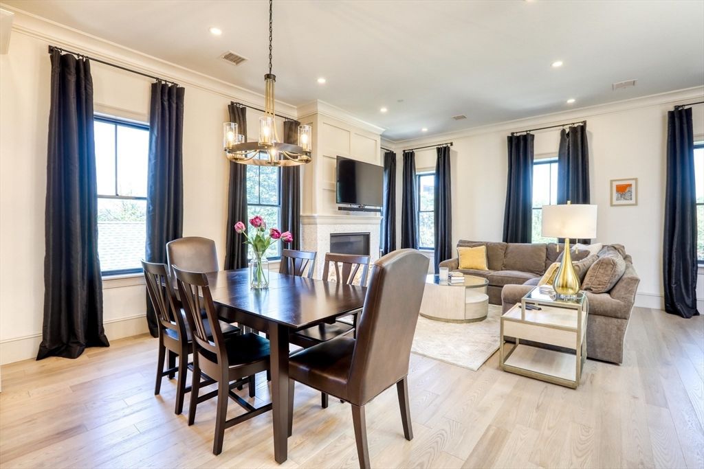 Dining room, Fireplace, Interior, Living room, Pendant Lights, Recessed Lighting, Wood Texture Flooring