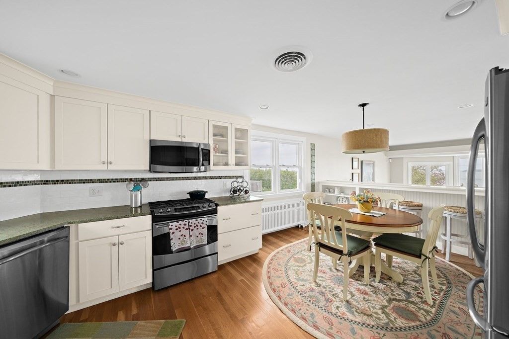 Dining room, Interior, Kitchen, Recessed Lighting, Stainless Steel Appliances, Wood Texture Flooring
