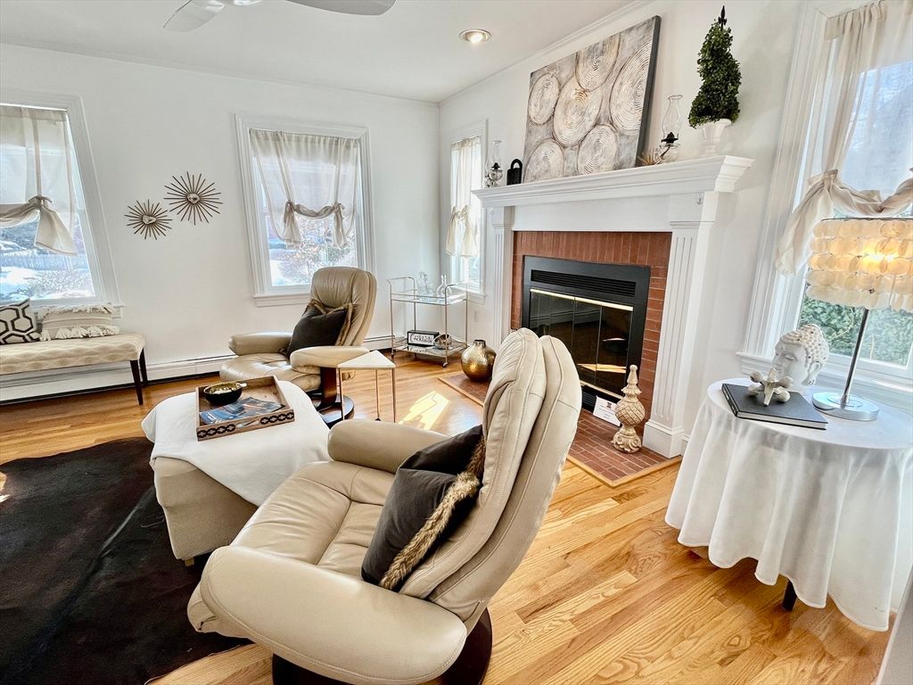 Fireplace, Interior, Living room, Recessed Lighting, Stone Walls, Wood Texture Flooring