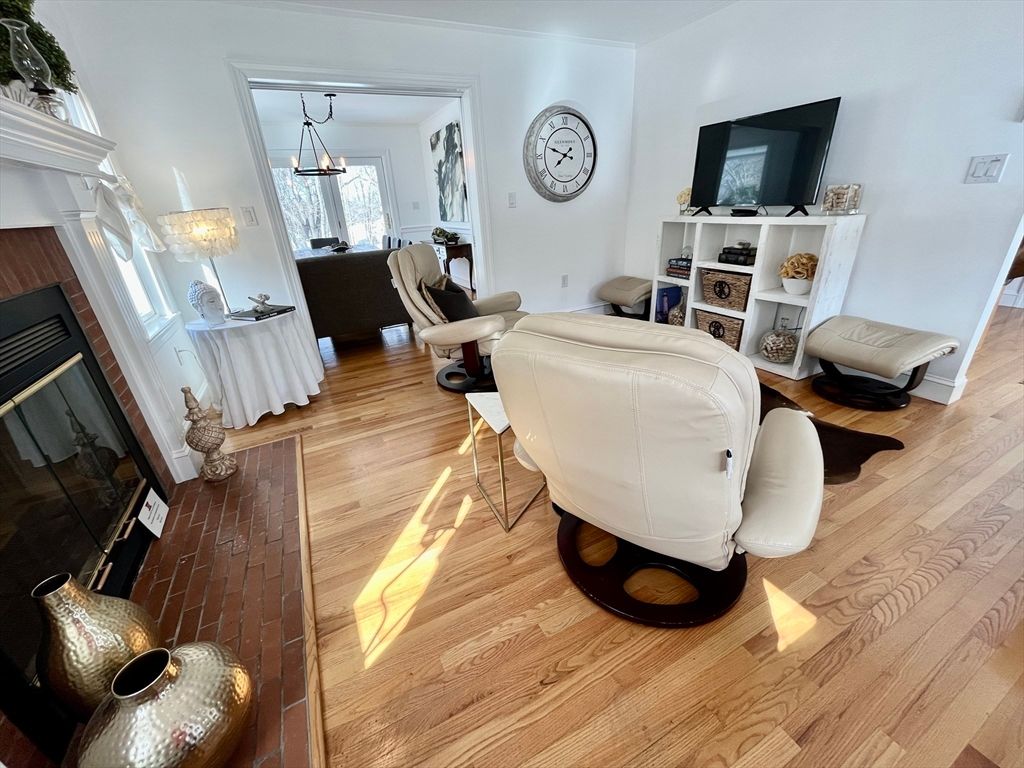 Dining room, Fireplace, Interior, Pendant Lights, Wood Texture Flooring