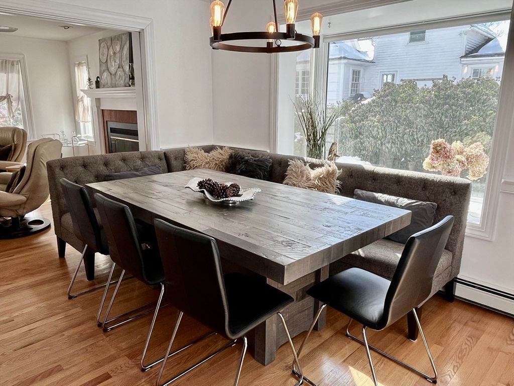 Dining room, Fireplace, Interior, Pendant Lights, Wood Texture Flooring