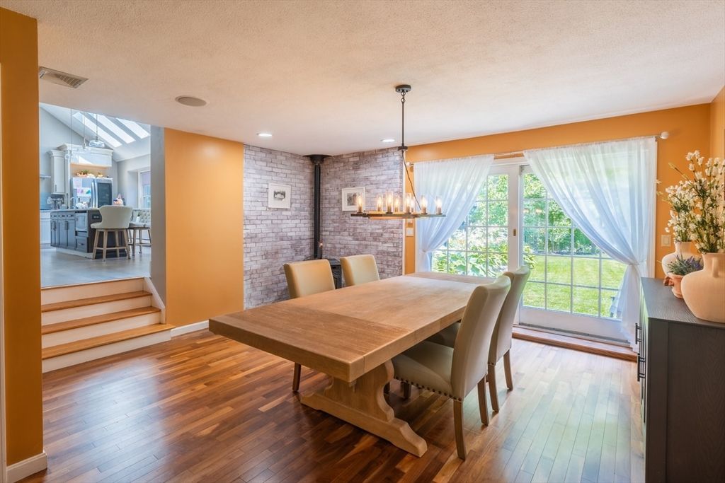 Chandelier, Dining room, Interior, Pendant Lights, Recessed Lighting, Stone Walls, Wood Texture Flooring