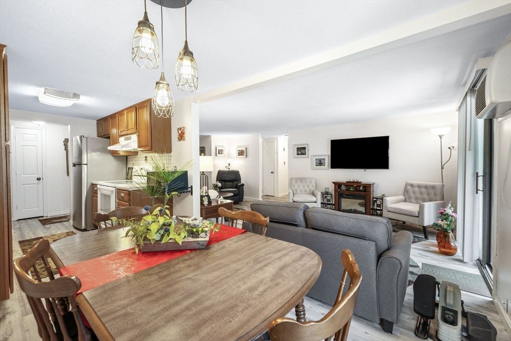 Dining room, Interior, Kitchen, Living room, Pendant Lights, Stainless Steel Appliances, Wood Texture Flooring