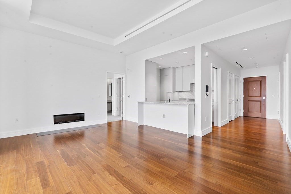 Empty room, Fireplace, Interior, Kitchen, Recessed Lighting, Wood Texture Flooring