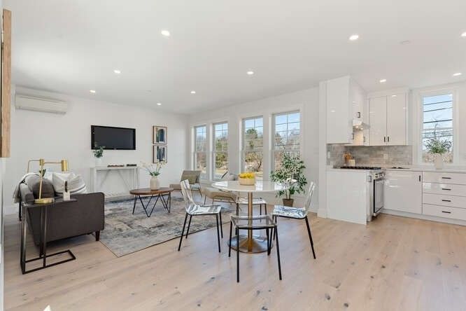 Dining room, Interior, Kitchen, Living room, Recessed Lighting, Stainless Steel Appliances, Wood Texture Flooring