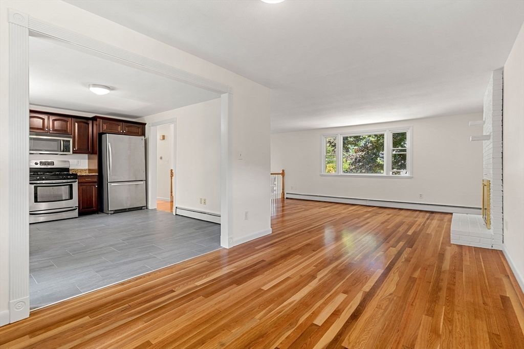 Empty room, Interior, Kitchen, Stainless Steel Appliances, Wood Texture Flooring