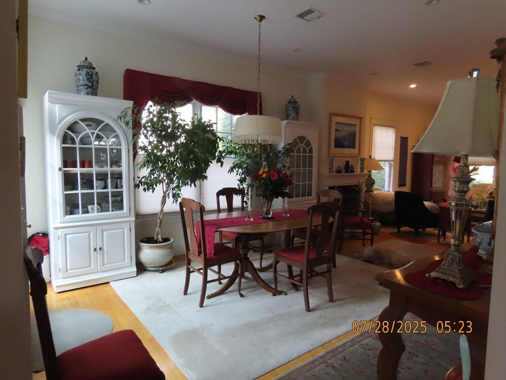 Dining room, Fireplace, Interior, Living room, Pendant Lights, Recessed Lighting, Wood Texture Flooring