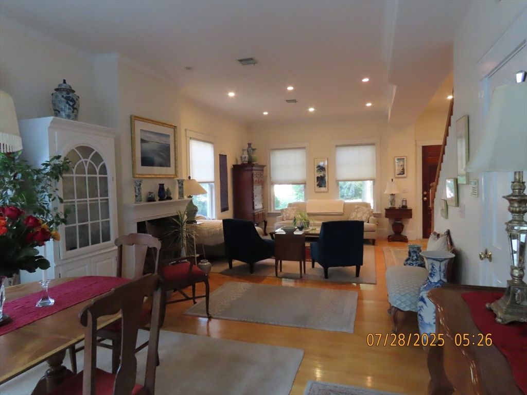 Dining room, Fireplace, Interior, Living room, Recessed Lighting, Wood Texture Flooring