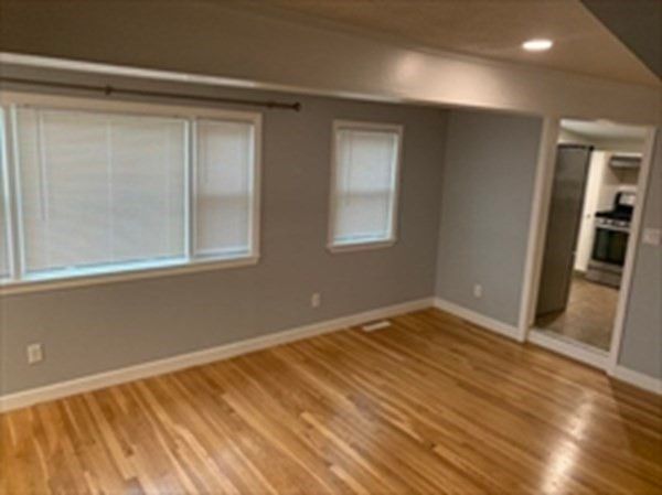 Empty room, Interior, Recessed Lighting, Stainless Steel Appliances, Wood Texture Flooring