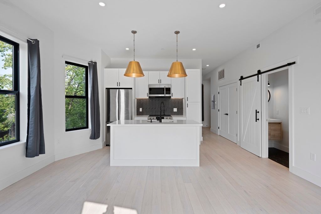 Interior, Kitchen, Pendant Lights, Recessed Lighting, Stainless Steel Appliances, Wood Texture Flooring