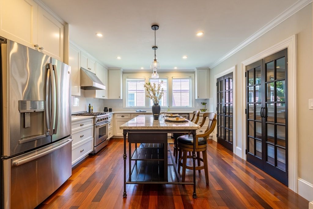 Dining room, Interior, Kitchen, Pendant Lights, Recessed Lighting, Stainless Steel Appliances, Wood Texture Flooring