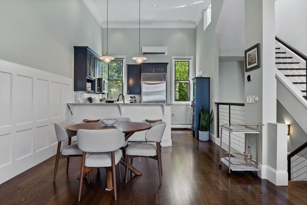 Dining room, Interior, Kitchen, Pendant Lights, Recessed Lighting, Stainless Steel Appliances, Wood Texture Flooring